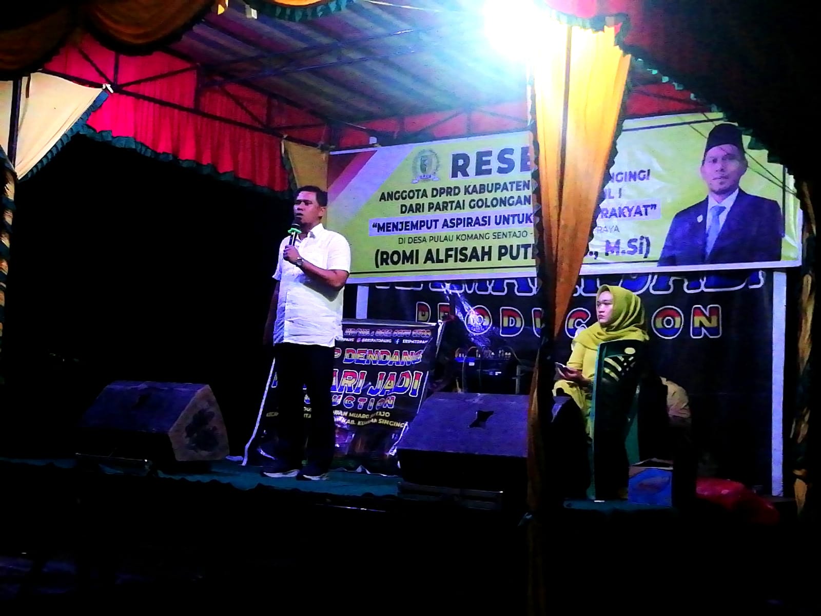  Sambutan  Romi Alfisah Putra SE, M.Si saat reses anggota DPRD Kuantan Singingi di Desa Pulau Komang Sentajo Kamis malam (16/3/2023)./ist